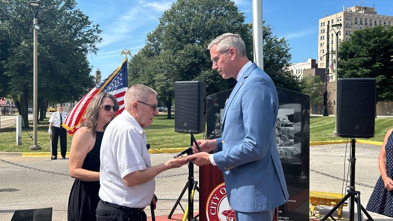 Treasurer Frerichs returning Purple Heart to D-Day veteran