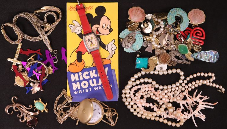 Mickey Mouse watch and other jewelry, including a pocket watch and necklaces