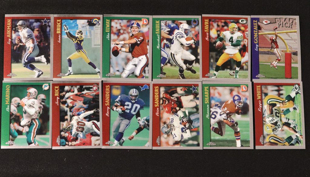 12 football trading cards including Troy Aikman, John Elway and other star NFL players