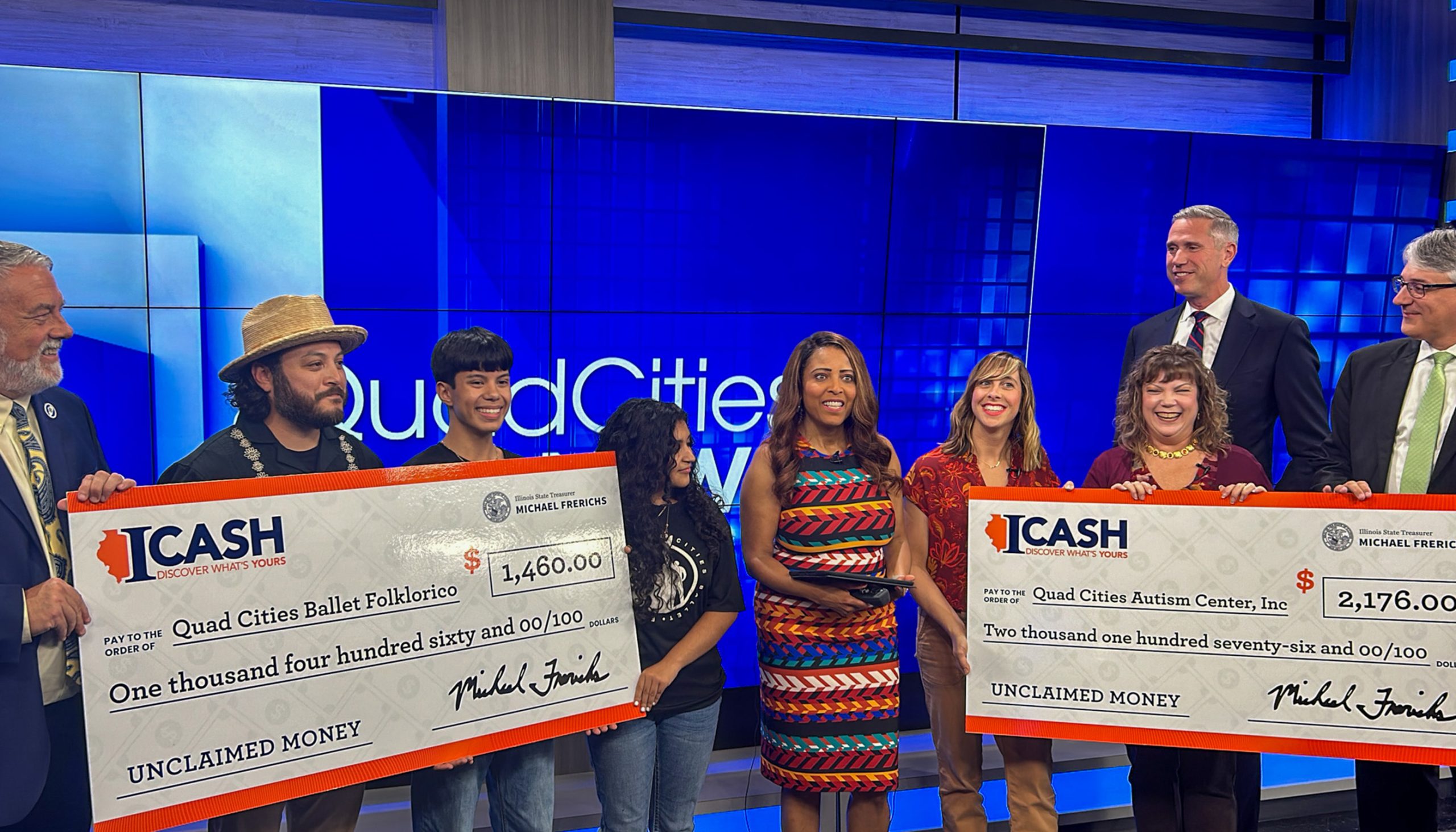 Treasurer Frerichs gives giant ICash checks to about 5 people