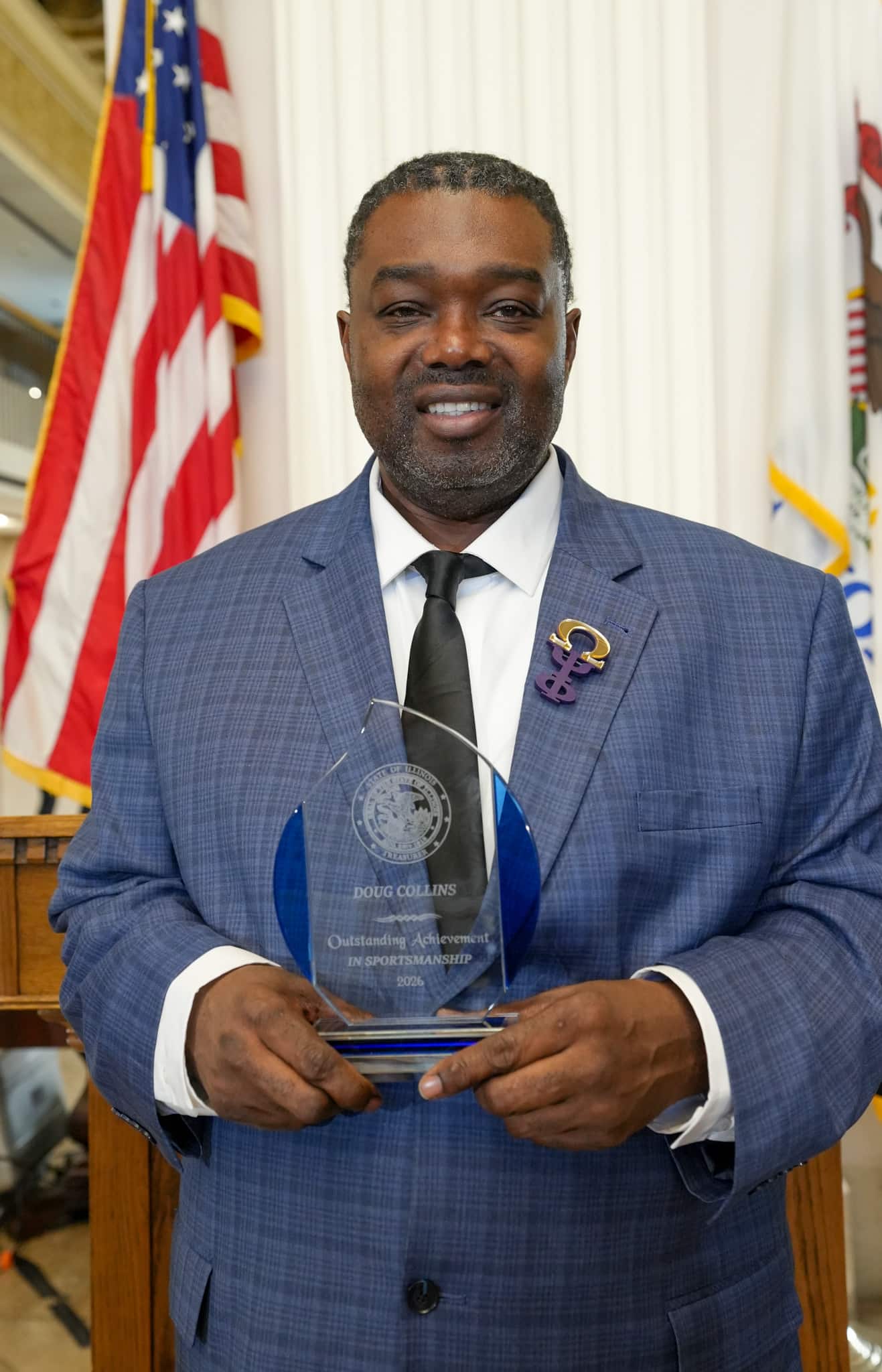 Christopher Mallette with award at Black History Month Event