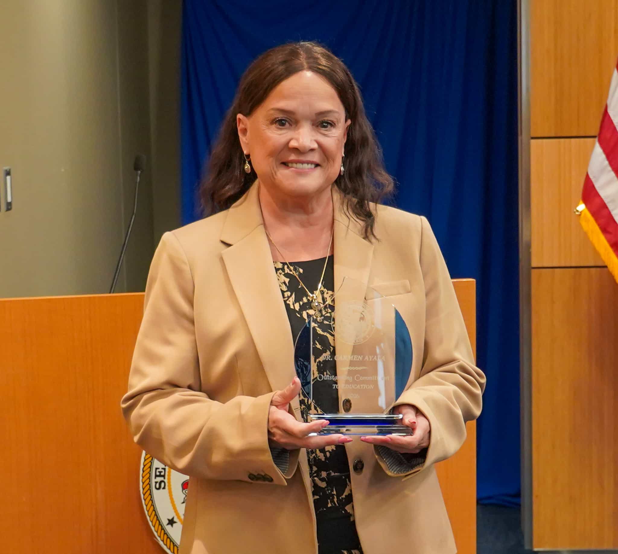 Christopher Mallette with award at Black History Month Event