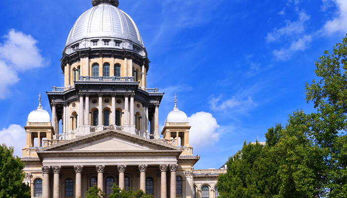 Exterior of Illinois State Capitol against a blue sky
