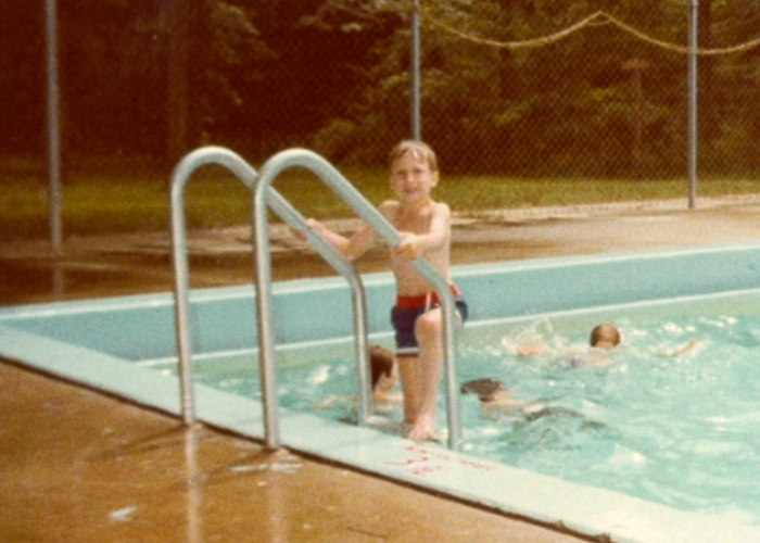 Treasurer Frerichs as a boy, around age 8, climbing the stairs to exit a swimming pool