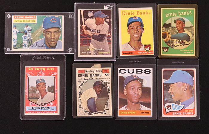 Eight baseball cards from the 1950s and 1960s, all featuring Ernie Banks of the Chicago Cubs